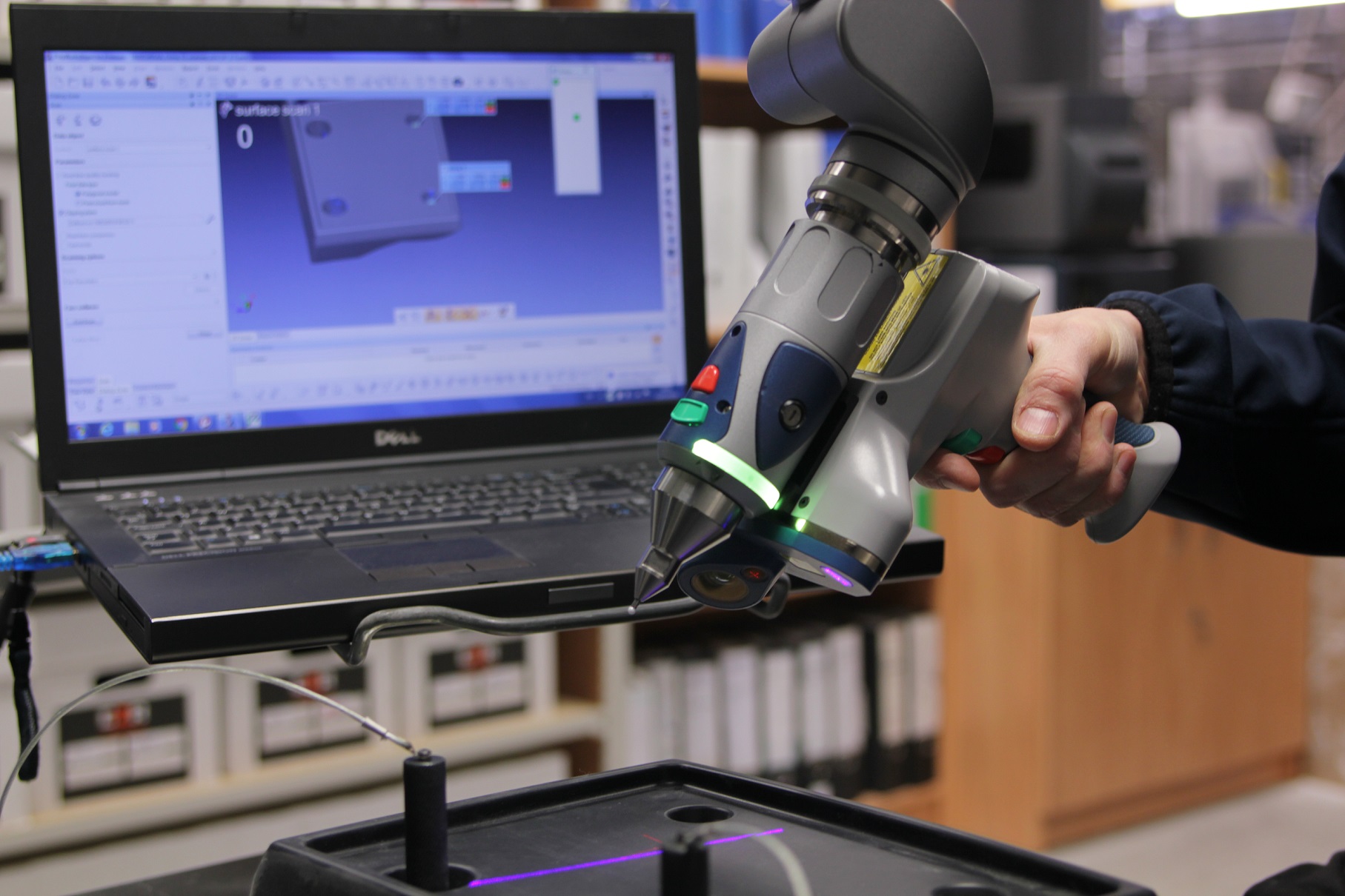 3D Scan arm being used to measure a part