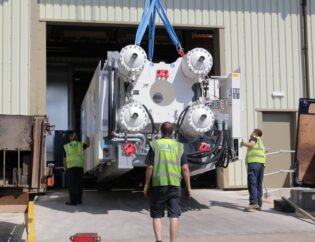 An Injection Moulding being moved into the MGS facility