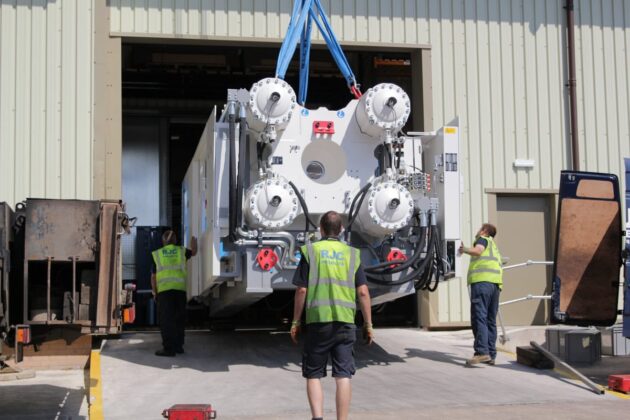 An Injection Moulding being moved into the MGS facility